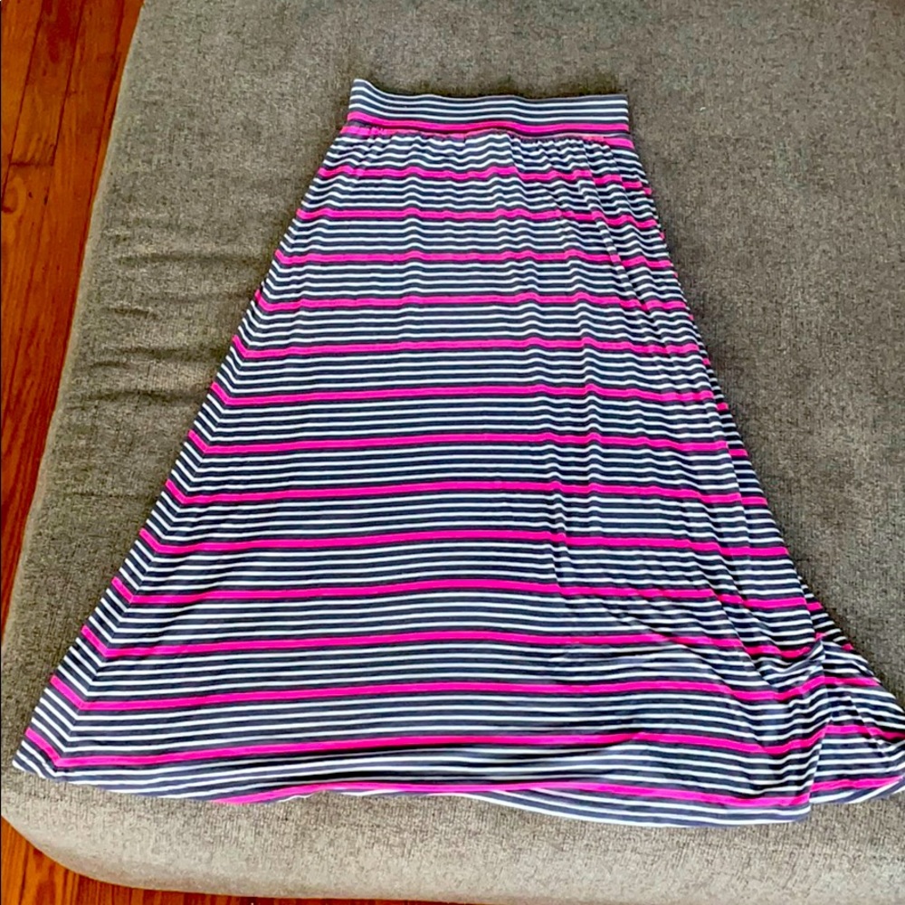 A purple pink and white striped skirt